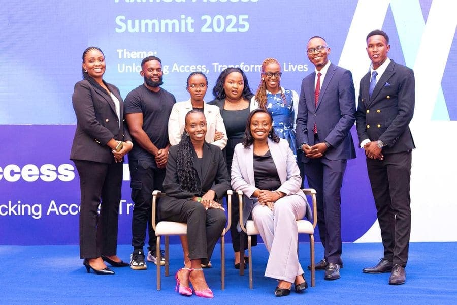 Newmark team seated on stage